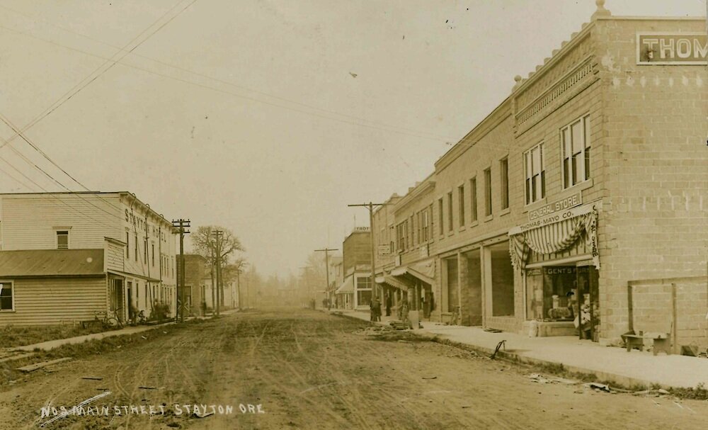 Street view of downtown Stayton, Oregon showing commercial storefronts